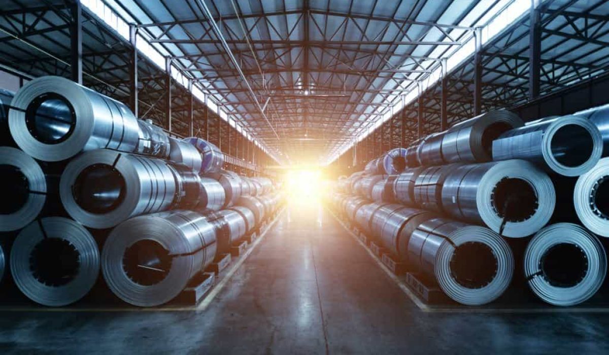 Roll of galvanized steel sheet at metalworking factory.